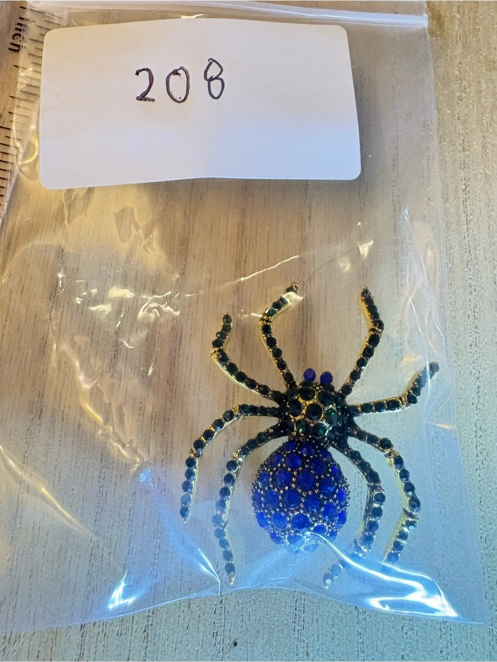 Gold-tone Spider Brooch with Blue and Green Rhinestones